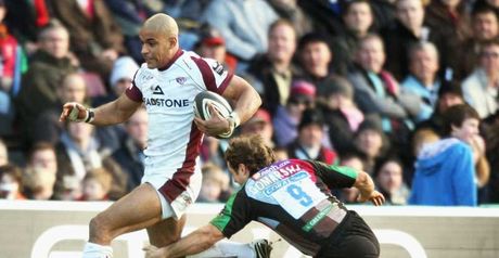 Try time: Varndell beats Andy Gomarsall on his way to his second try