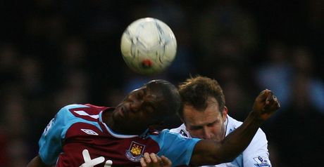 Heads I win: Carlton Cole beats Dietmar Hamann in the air.