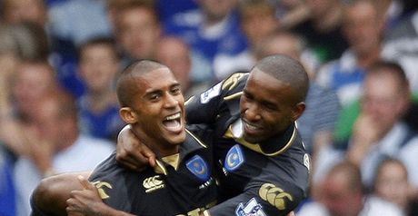 Traore and Defoe celebrate the opening goal