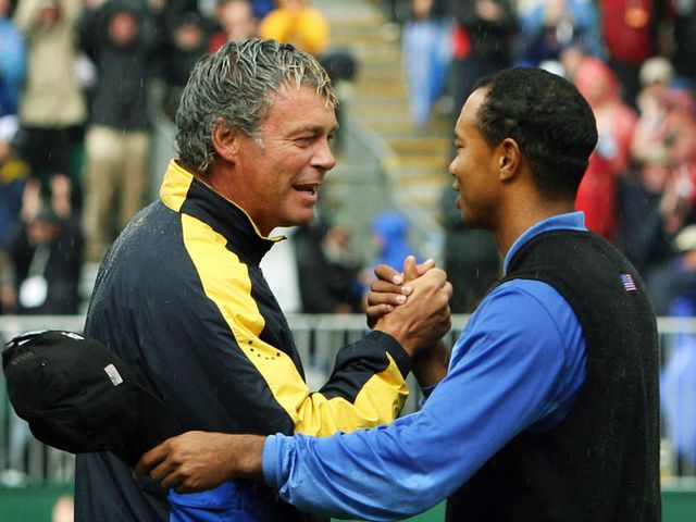 Clarke is congratulated by Tiger Woods&nbsp;