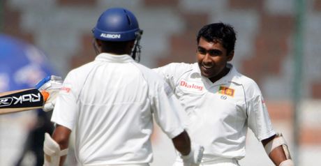 Jayawardene (right) is congratulated by Samaraweera on reaching his double century