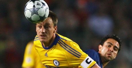 Xavi battles with John Terry