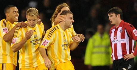 Taylor celebrates his winner at Bramall Lane