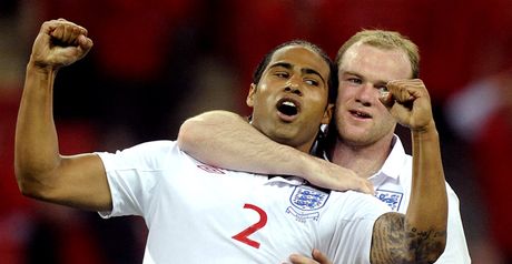 Johnson celebrates his goal with Rooney