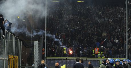 Riot police attempt to control fans