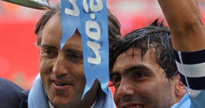 Carlos Tevez: Lifted the FA Cup with Roberto Mancini before falling out with the Manchester City boss