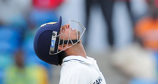 Head back: Raina's reaction to being given out proved costly