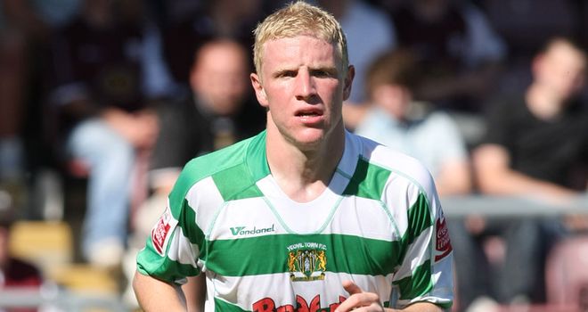 Alcock: Has agreed a three-year contract at Peterborough after compensation was agreed with Yeovil