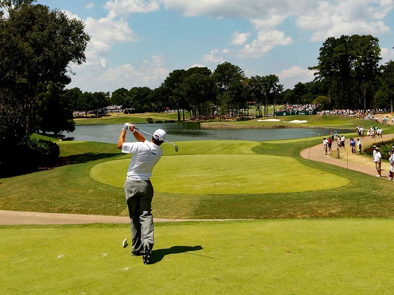 Lee Westwood hits to the long par three fourth hole.
