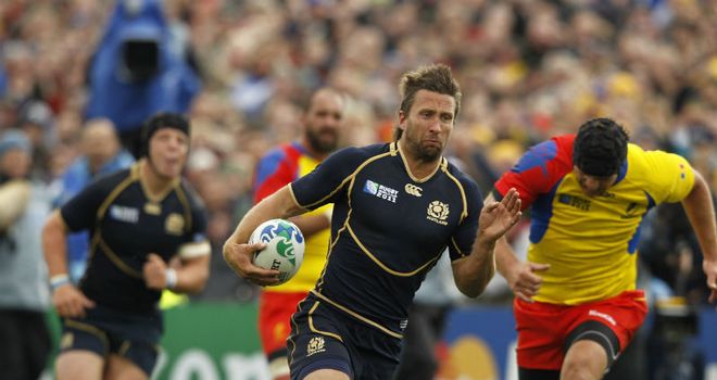On the run: Simon Danielli in action for Scotland
