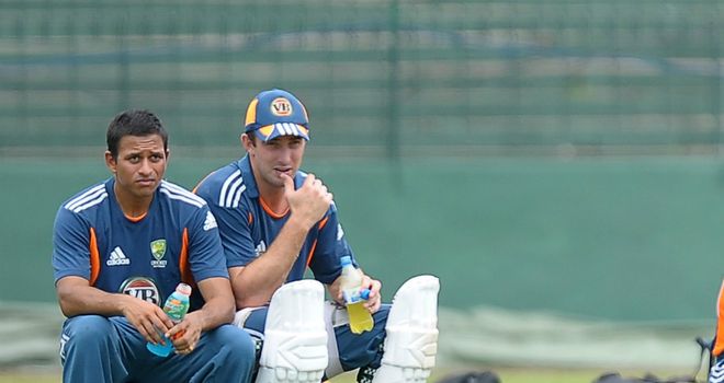Changing places: Khawaja (left) and Marsh
