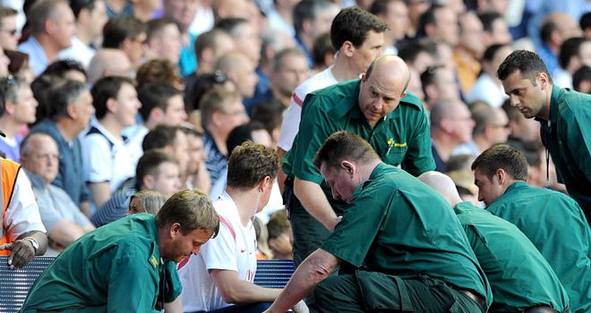 Sagna: Stretchered off after a nasty fall in a challenge with Assou-Ekotto