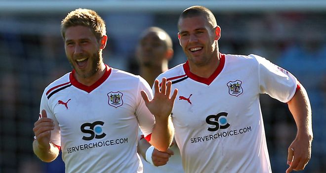Long (left): Signed for Dons