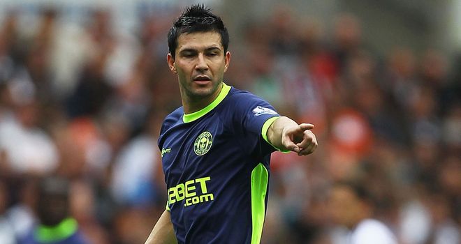 Antolin Alcaraz: Wigan defender has not broken rib but remains doubtful to face Chelsea