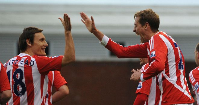 Dean Whitehead(l) has hailed Peter Crouch and is targeting a top ten finish for the Potters