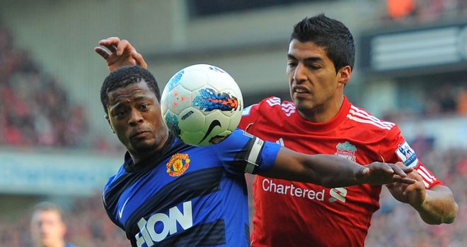 Patrice Evra and Luis Suarez: Duo set to meet again at Old Trafford on Saturday