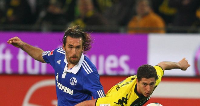 Christian Fuchs (L): Schalke full-back was watched by Manchester United scouts against Borussia Dortmund
