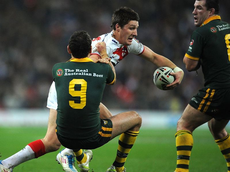 Gareth Widdop tangles with a couple of his NRL colleagues