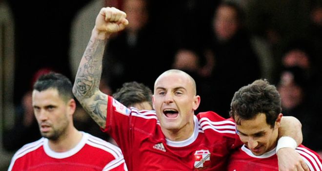 De Vita (right): Celebrates his goal with McCormack