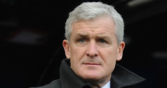 Mark Hughes: Could be without Luke Young and Bobby Zamora for Blackburn game