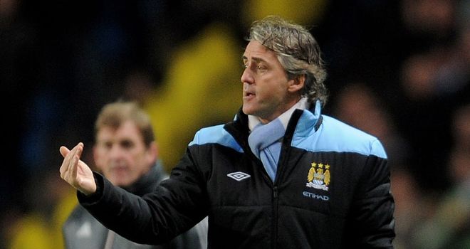 Roberto Mancini: Has played down concerns over Man City's away form