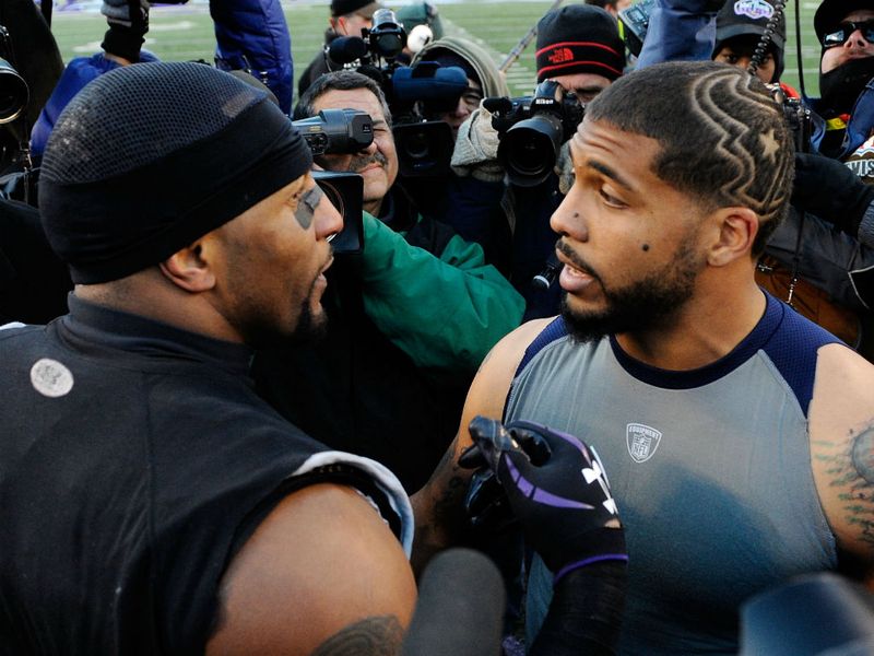 Ray Lewis (L) and Arian Foster speak after the game.