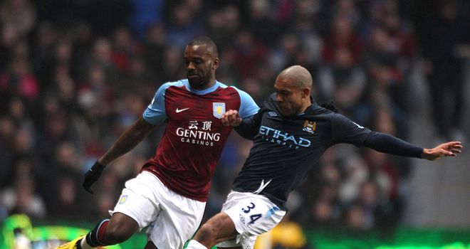 Nigel De Jong: Claims Manchester City are not feeling the pressure from Manchester United