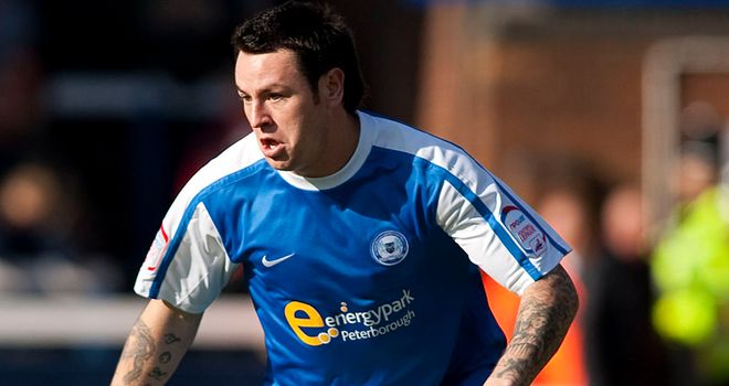 Lee Tomlin: Set Peterborough on their way to win at Molineux