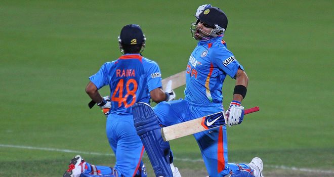 Virat Kohli jumps for joy after hitting the winning runs in Hobart