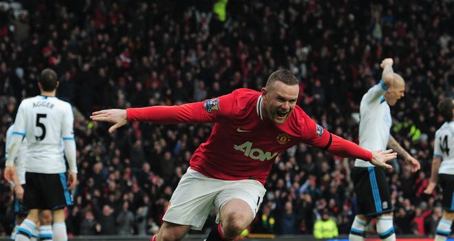 Wayne Rooney: Expects a tough battle at the head of the table