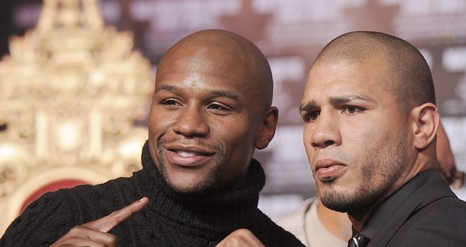 Mayweather (l) and Cotto meet on Saturday