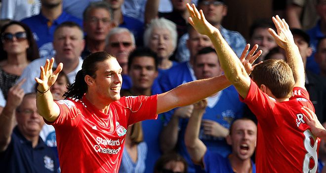 Steven Gerrard is happy for Andy Carroll after the striker scored against Everton