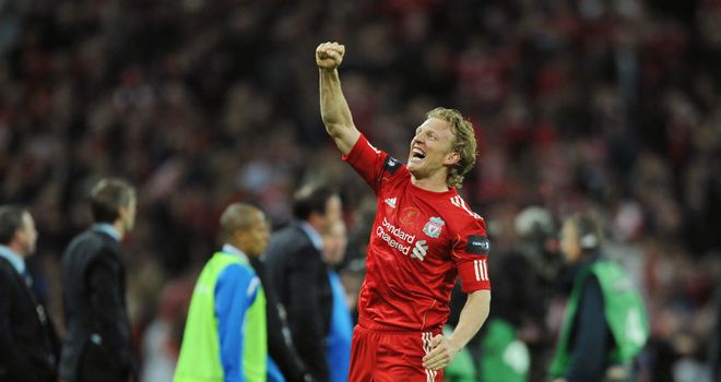 Dirk Kuyt: Liverpool striker celebrating the Carling Cup win over Cardiff on penalties