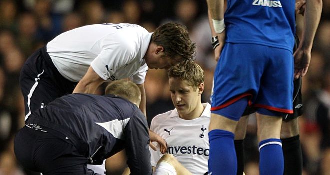 Michael Dawson: Spurs defender facing lengthy spell out after suffering injury against Stevenage