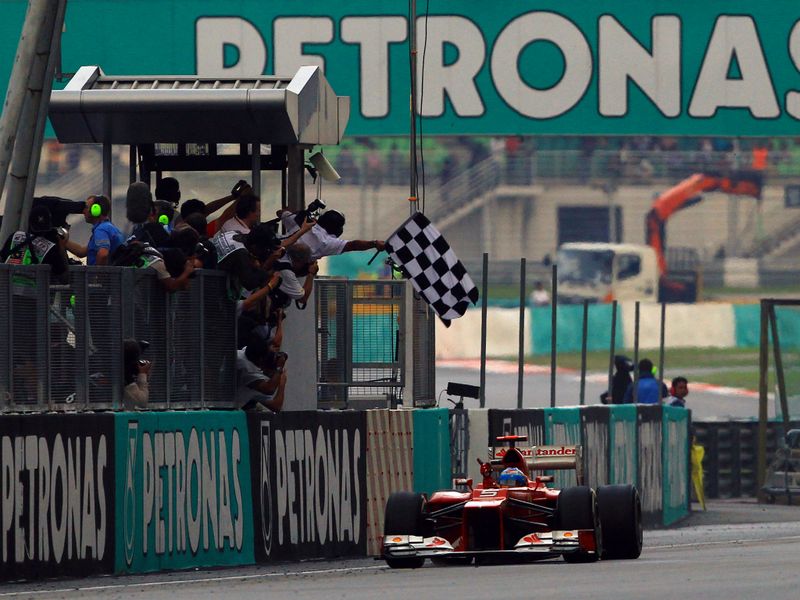 Alonso takes the checkered flag