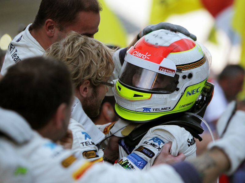 Sergio Perez celebrates with the Sauber team