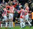 Peter Crouch celebrates his winning goal against Wolves