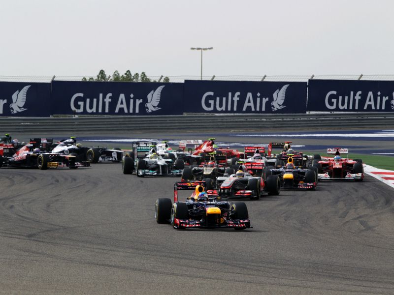 Vettel leads the battle out of turn one