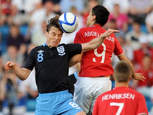 Scott Parker jumps with Mohamed Abdellaoui