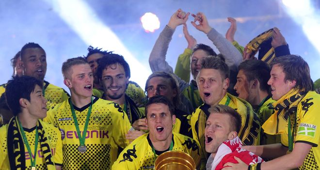 Borussia Dortmund celebrate the first league and cup double in their history