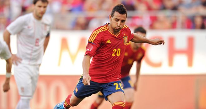 Santi Cazorla fires home Spain's second goal from the penalty spot