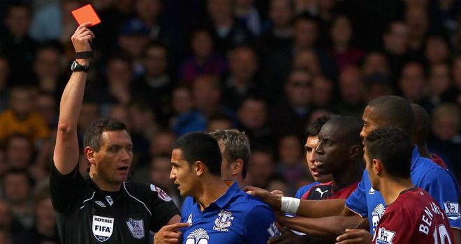Tim Cahill receives his marching orders following his confrontation with Yohan Cabaye
