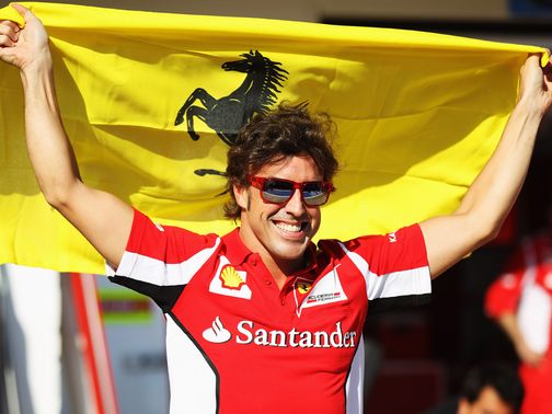 Fernando Alonso enjoys his victory.