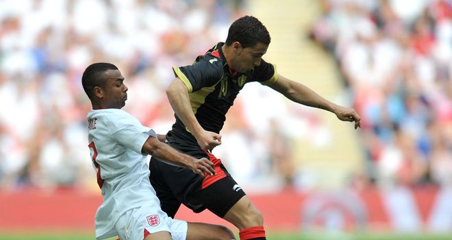 Eden Hazard takes on new Chelsea team-mate Ashley Cole at Wembley on Saturday