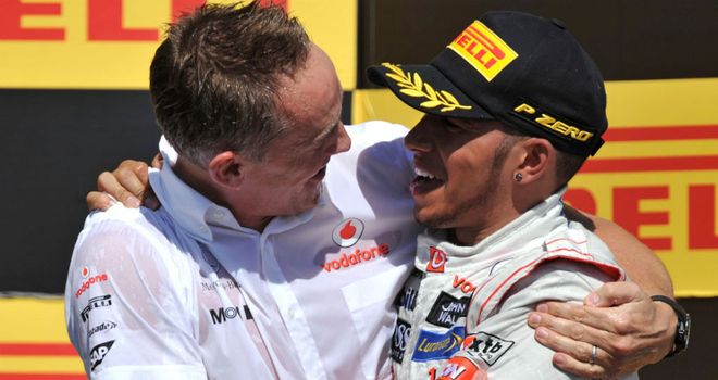 Martin Whitmarsh celebrates with his race winner