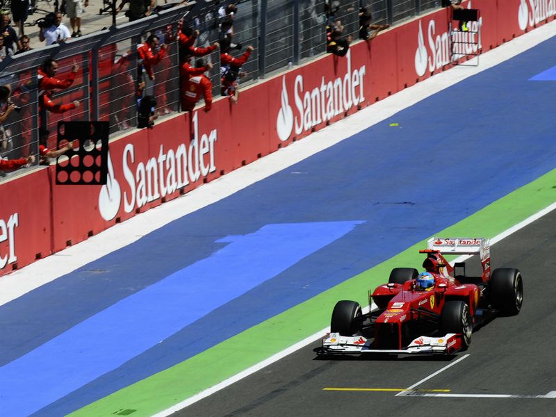 Alonso crosses the line
