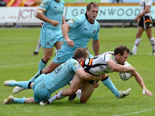 Brett Kearney claims one of his four Bradford tries