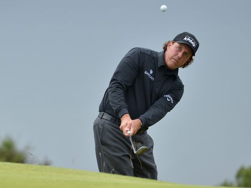Phil Mickelson: Is 11 shots off the lead