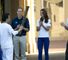 Applause: Wai-Ming carries the torch in front of the Duke and Duchess of Cambridge and Prince Harry