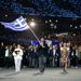 The flag parade begins with Greece, the motherland of the games,and they are followed by the other 204 nations who will compete in the games